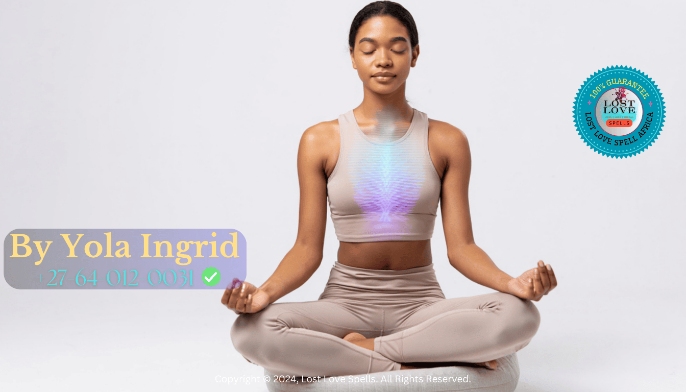 A calm person meditating with a soft green glow over the chest, symbolizing heart chakra healing and emotional openness for love spell alignment.
