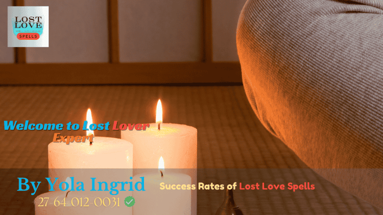 A person meditating with hands on heart, surrounded by candles and calming energy. (1)