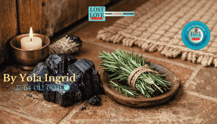 Black tourmaline and rosemary placed near an entryway for protection after love spell removal and energy cleansing.