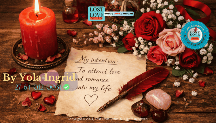 Candle, written intention, and flowers arranged on a table representing common ingredients used in love spells and their symbolism.