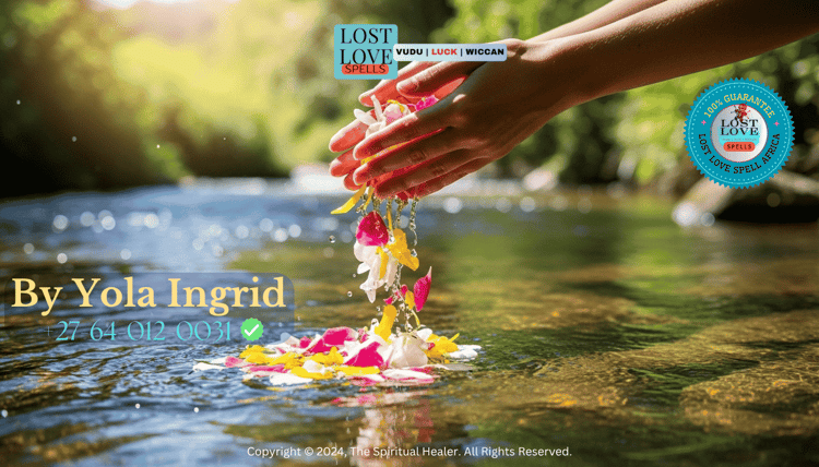 Hands releasing flower petals into running water as a gratitude offering after spell completion.