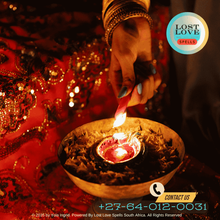 Indian woman performing a Vashikaran ritual with flowers and a diya lamp