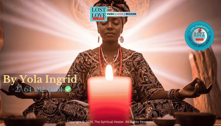 Lady Yola Ingrid meditating in front of a pink candle, visualizing pure love energy before casting a spell