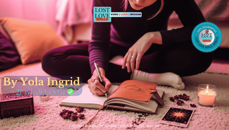 Person journaling with soft pink light, symbolizing reflection and love spell manifestation tracking.