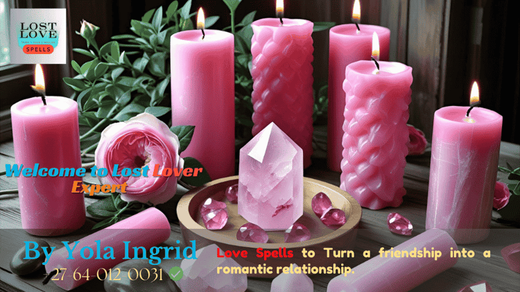 Pink candles and rose quartz arranged for a friendship to love spell