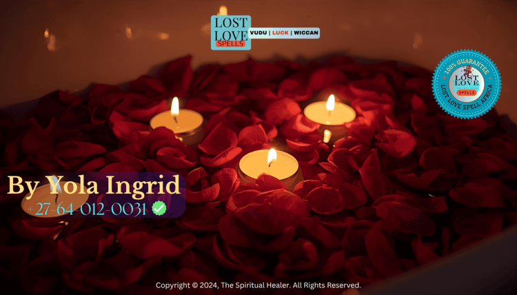 Rose petals and candles floating in a ritual bath for love spell cleansing.