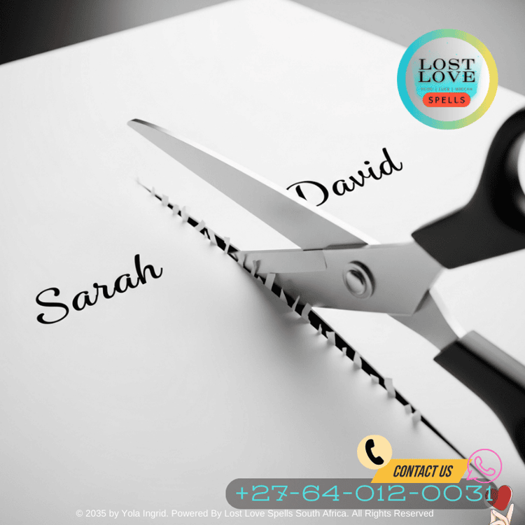 Scissors cutting paper with two names to symbolize a breakup