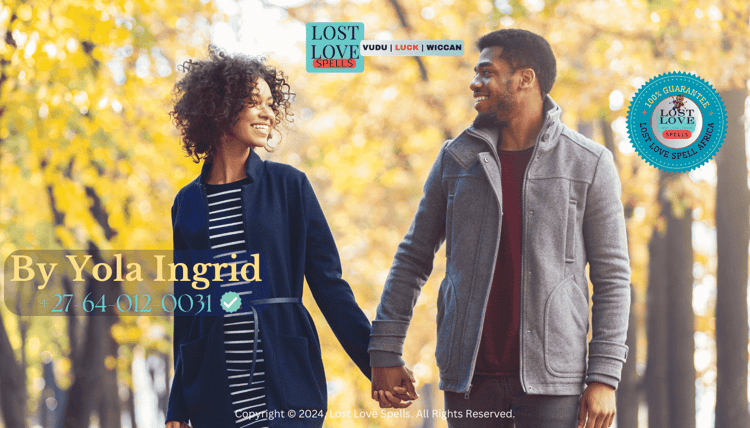 Couple holding hands during a healing conversation after overcoming infidelity and rebuilding trust.