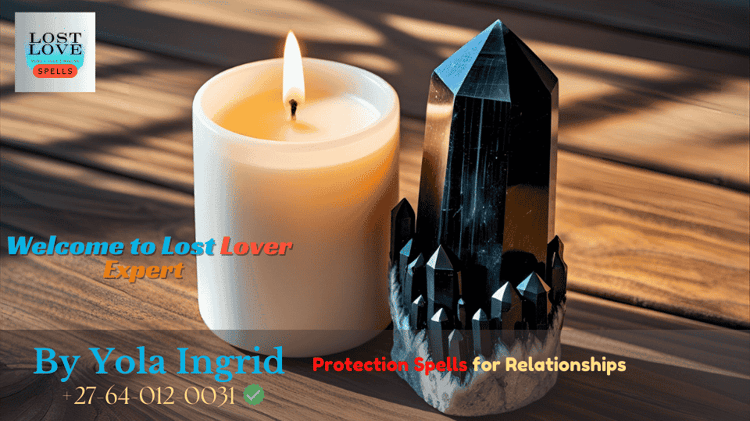 White candle and black tourmaline crystal for relationship protection